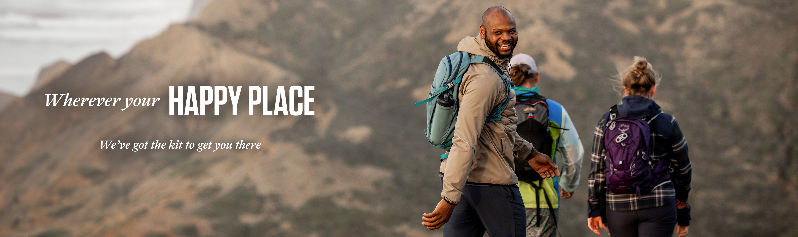 People walking together with the words 'Wherever your happy place, we've got the kit to get you there'