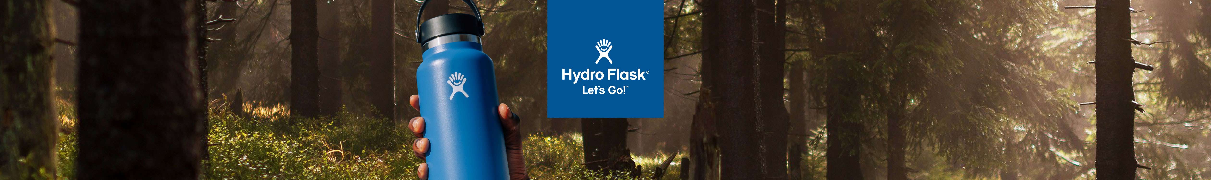 two people pointing in the distance with the Hydro Flask logo