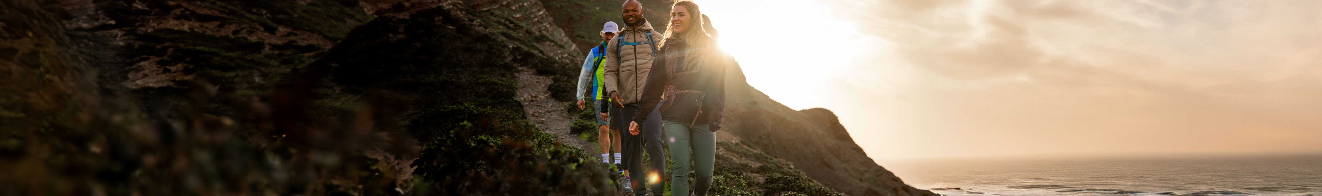 Group of persons walking outdoors