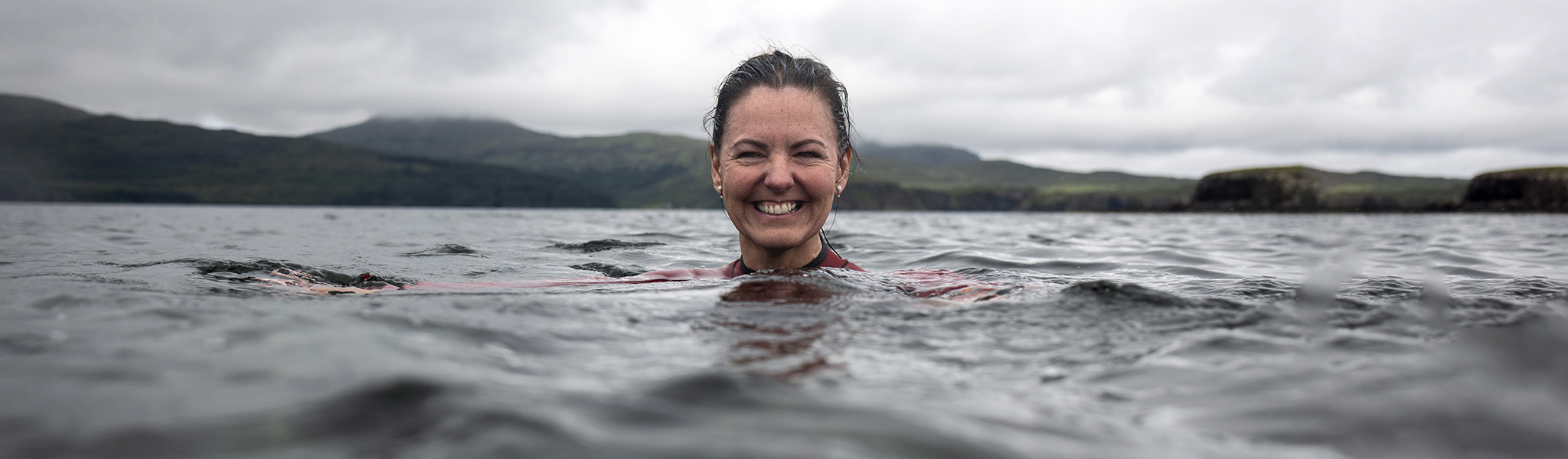 A woman wild swimming