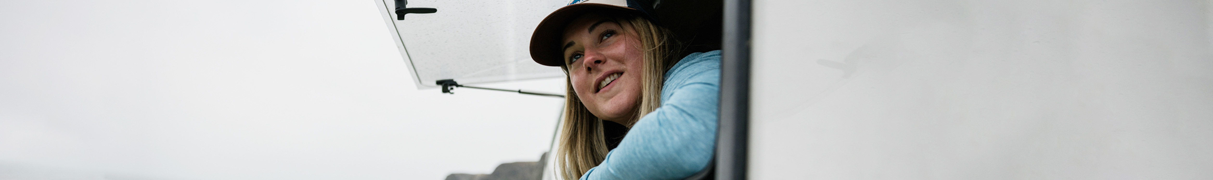 Woman sitting in a van