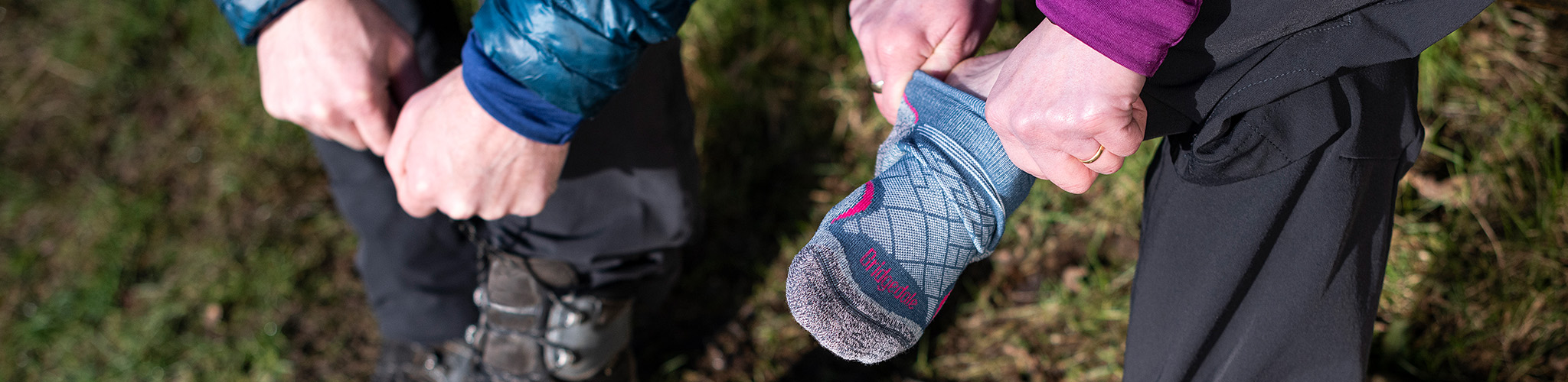 Person putting on socks