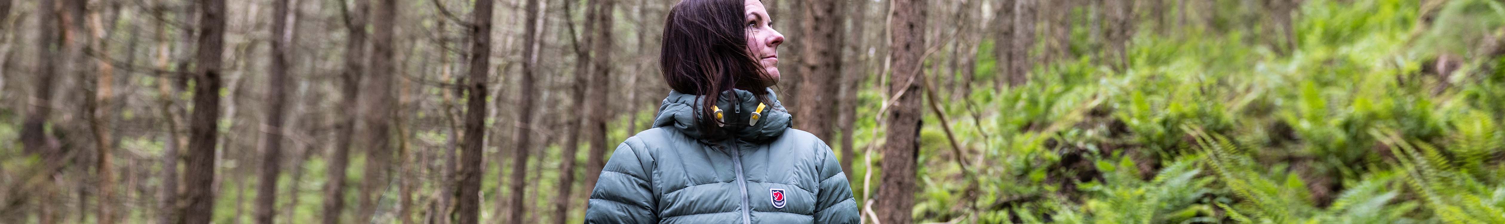 Woman walking in a forest