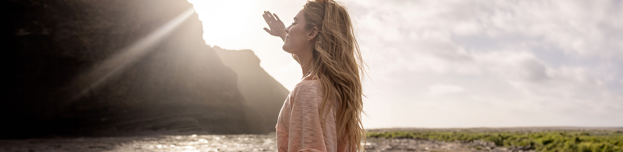 Woman walking near the ocean