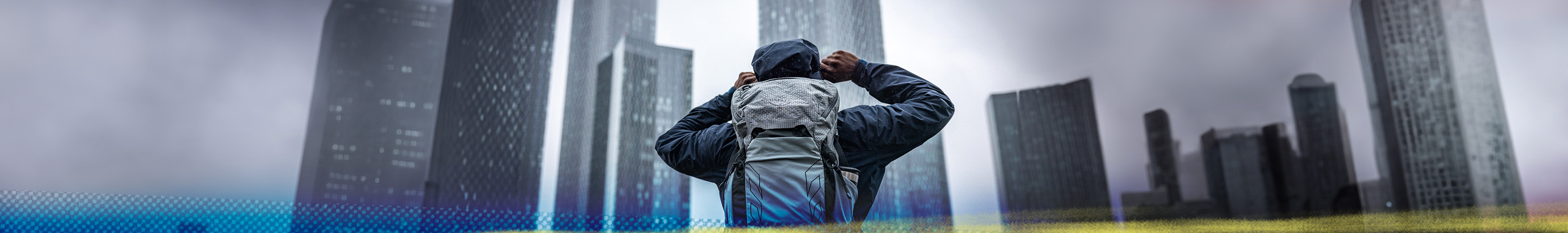 Man putting on a backpack