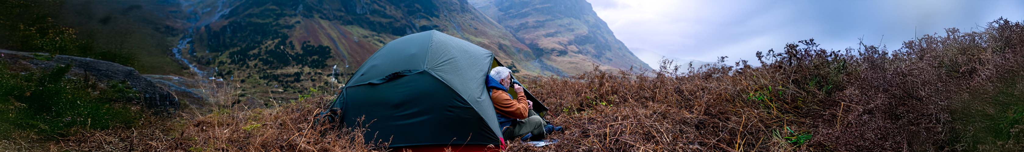 Man sitting in a tent