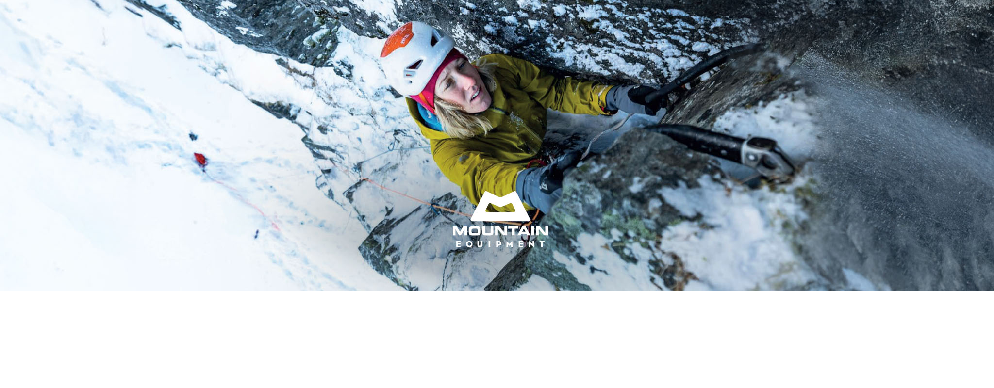 Woman climbing a rock mountain