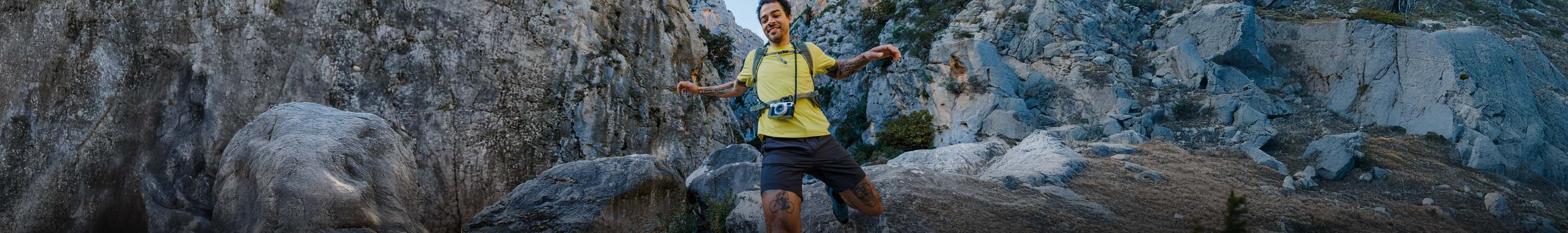 New Season. Man leaping across rocks