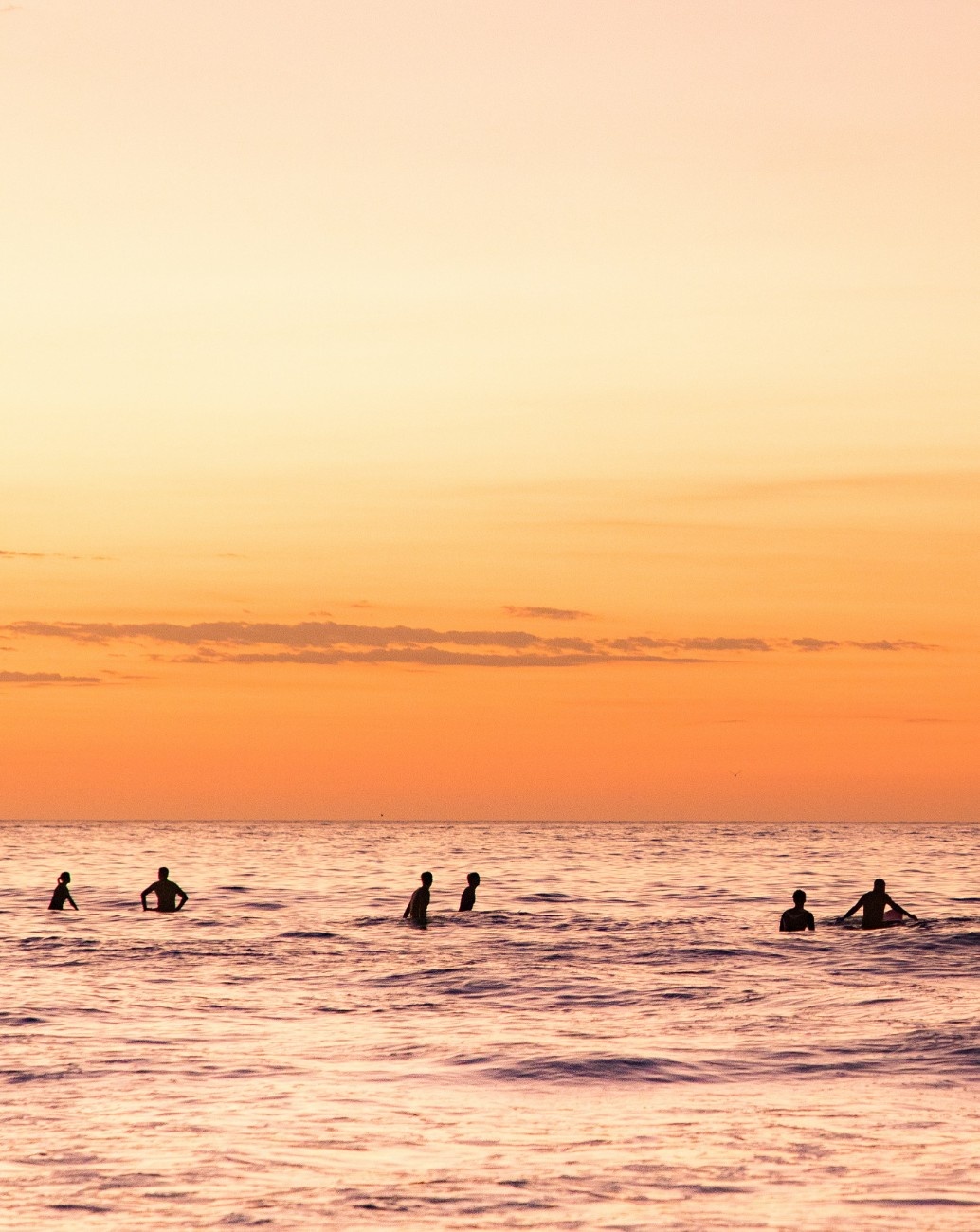 People playing in the sea at Bondi Beach