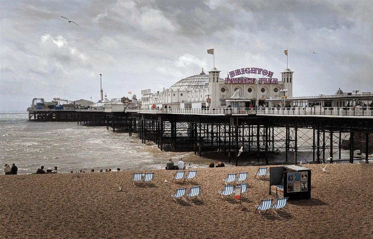 Deck chairs lined up next to Brighton Pier 