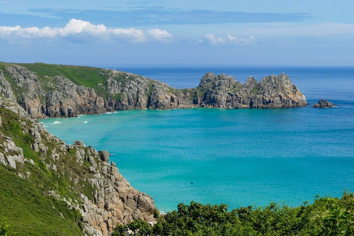 The cliffs surrounding Porthcurno beach