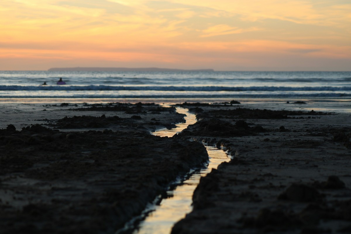 The sun setting at Woolacombe Beach