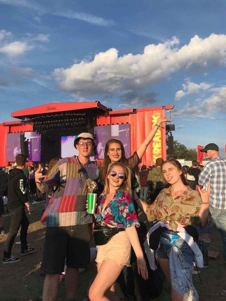 Friends in front of the Reading Festival main stage 