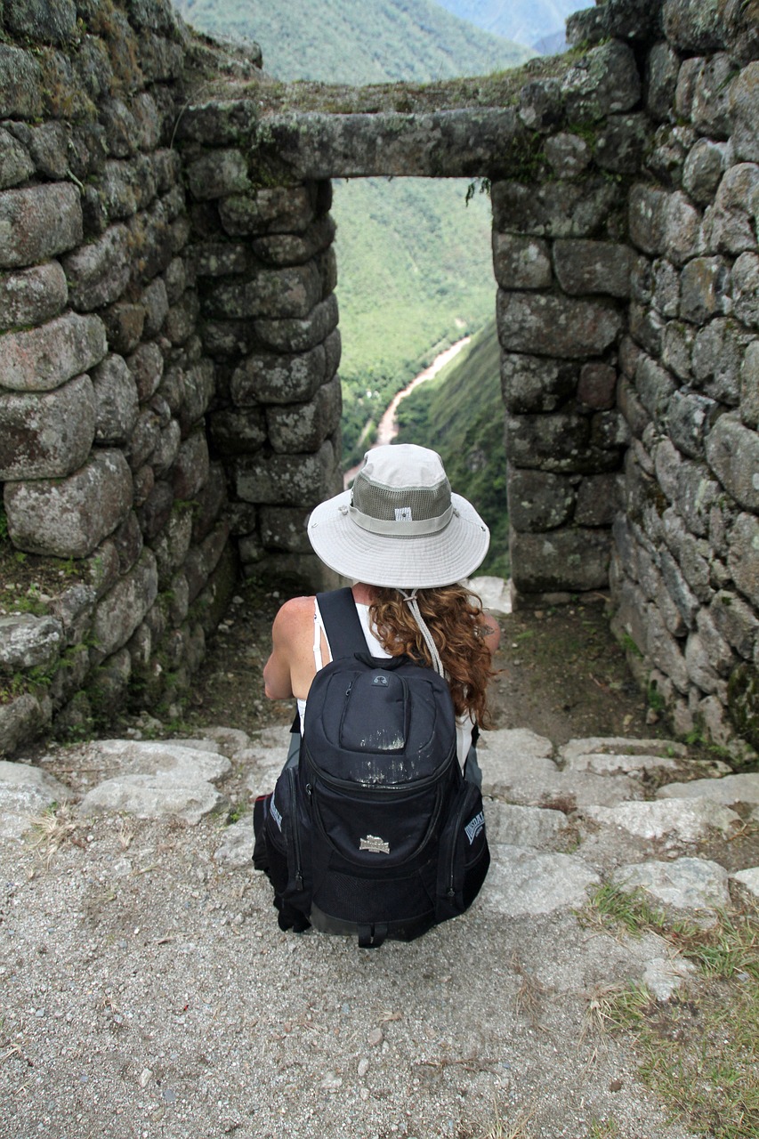 A woman sat at Machu Picchu