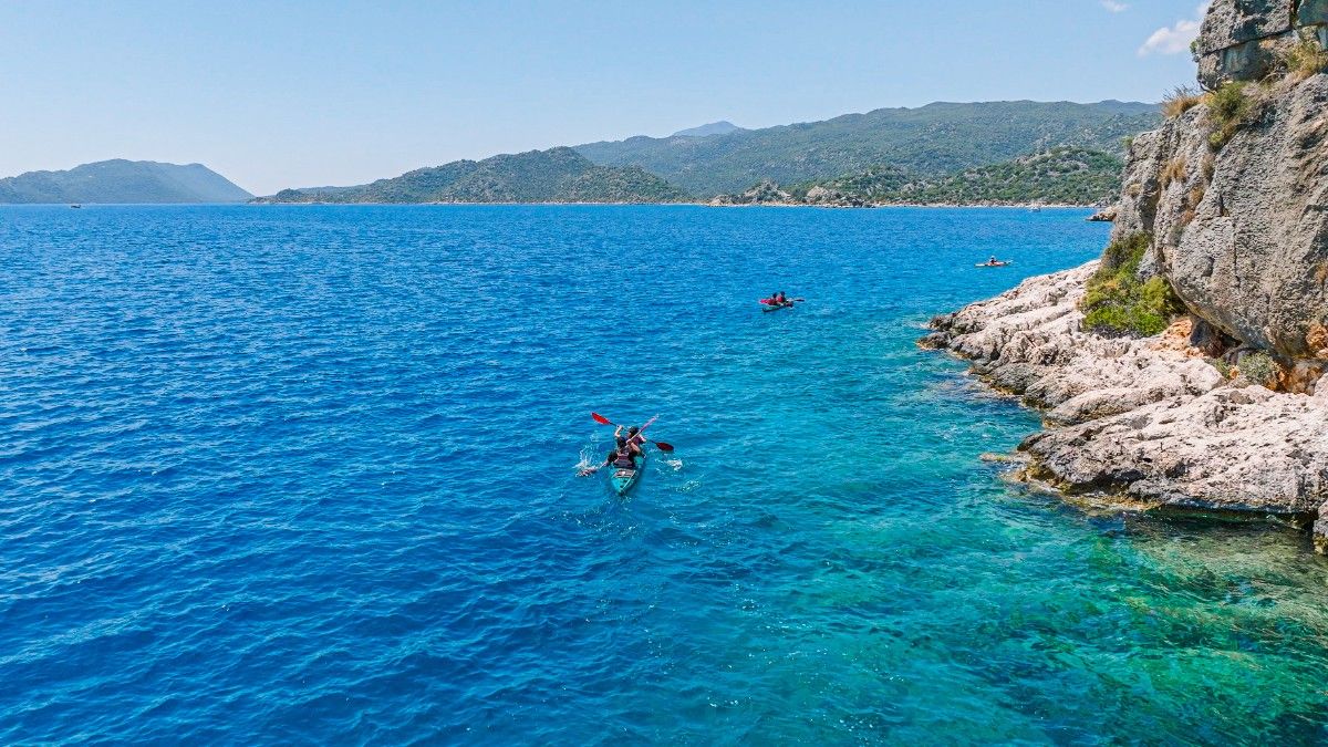 People kayaking on the coast of the Lycian Way