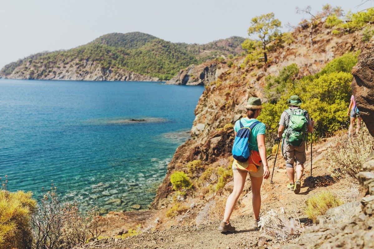 A group of people on a coastal hike 