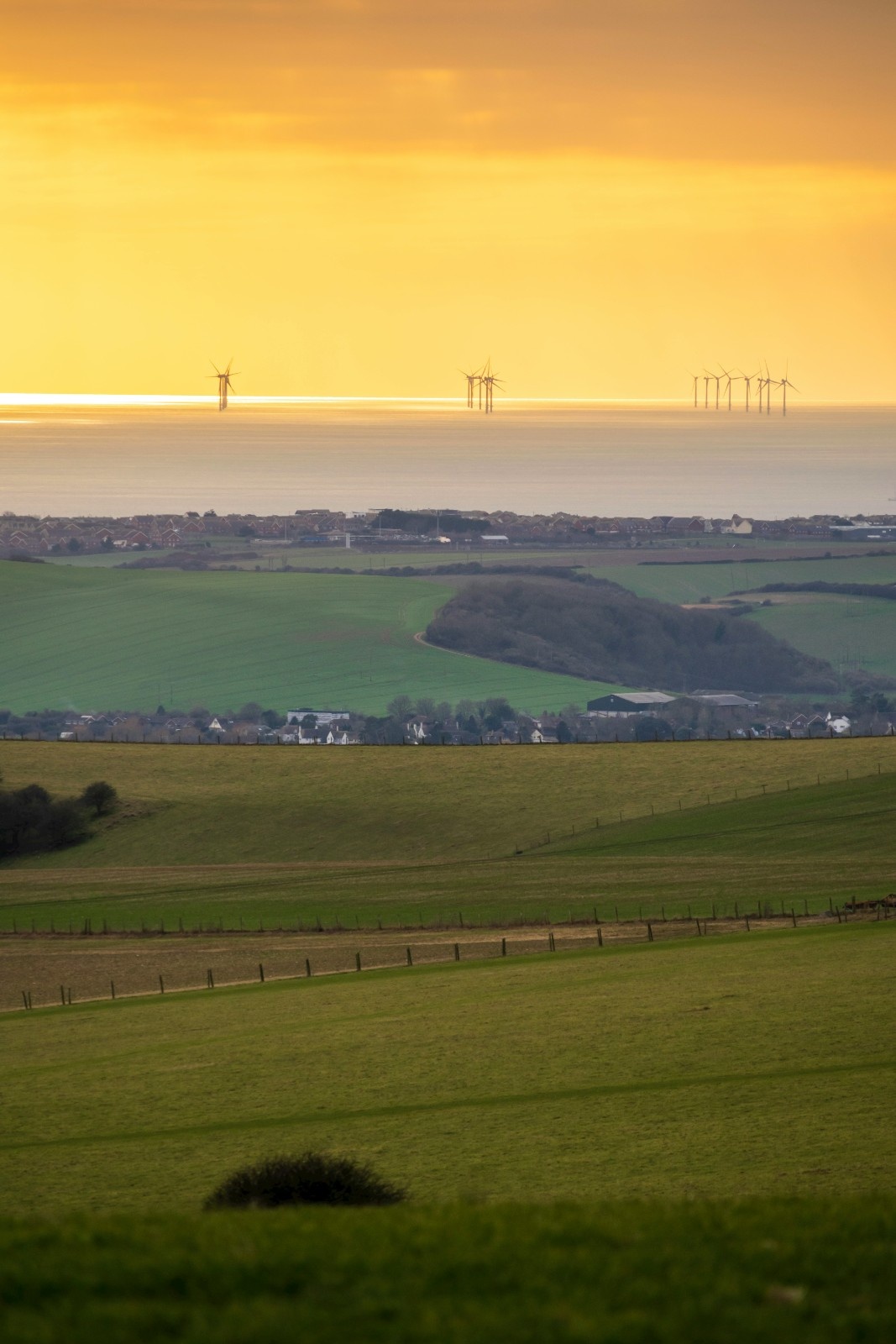 The sun setting on the South Downs