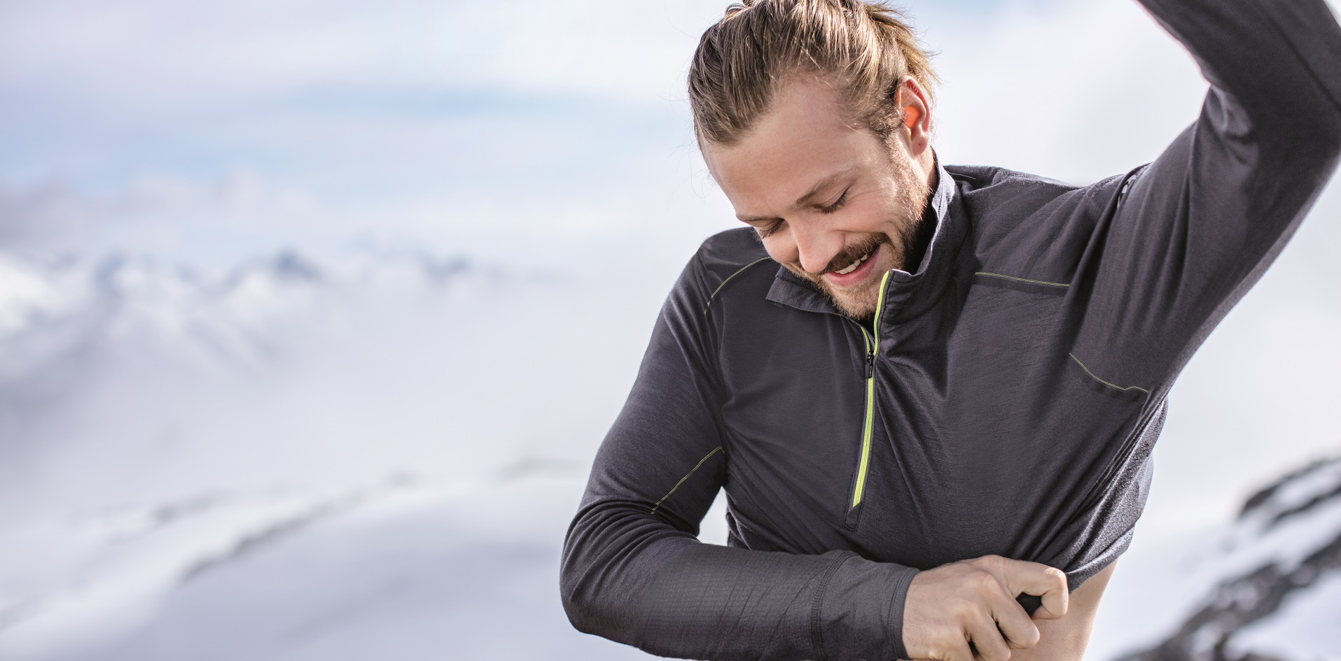 A man wearing a half zip fleece