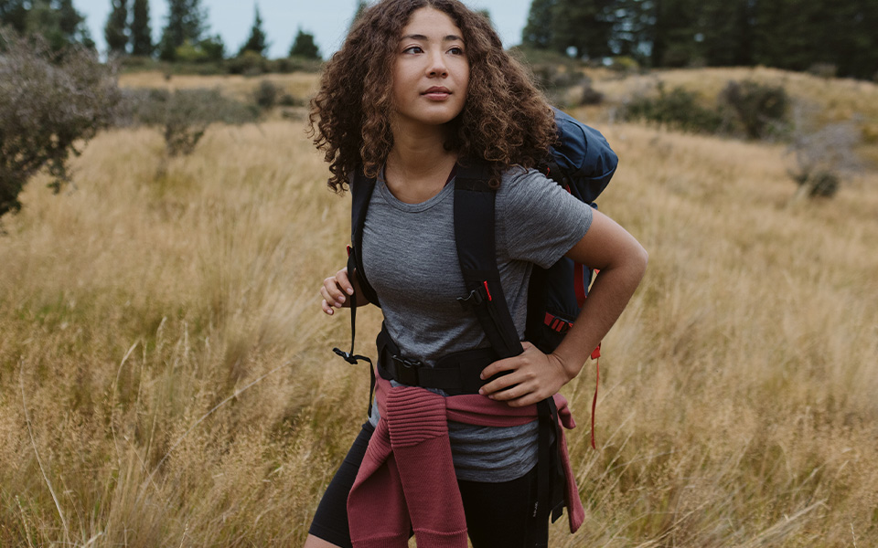 A woman in Icebreaker clothing 